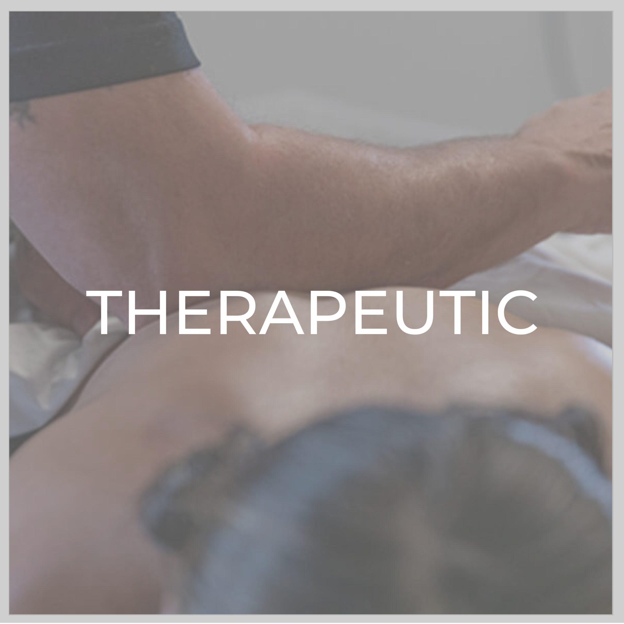 therapeutic massage scaled Therapeutic massage in progress, arm on client's back.